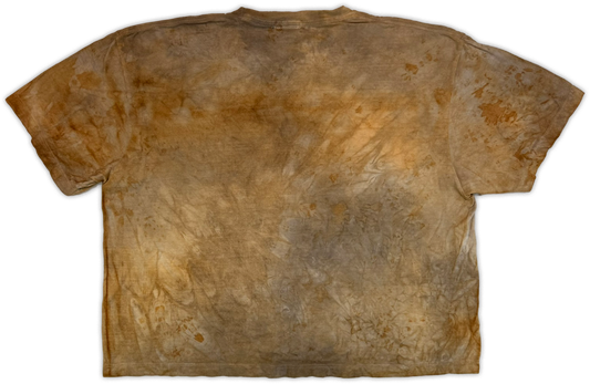 The back of a short-sleeve crewneck t-shirt with a mottled, distressed tie-dye pattern in earthy brown, tan, and beige tones, shown flat against a white background.