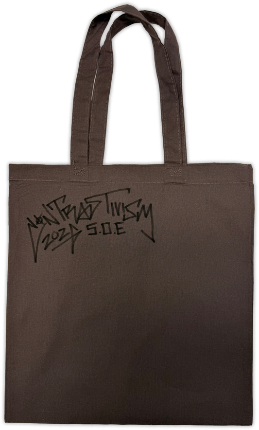 A dark brown canvas tote bag with black printed text reading 'contrastivism 2026 S.O.E.